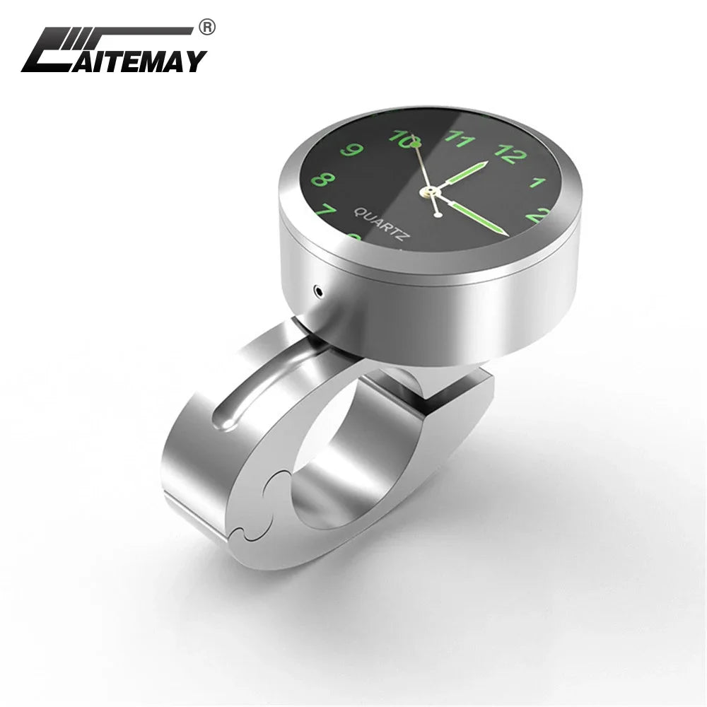 Petite horloge noire fixée sur le guidon d'une moto - vue 1