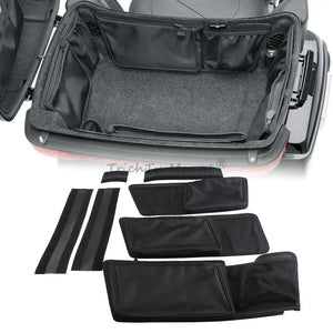 Organiseur en nylon noir installé à l'intérieur d'un top case de moto - vue 1